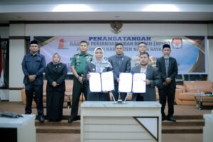 Pj Bupati Nagan Raya Fitriany Farhas , S.Sos M. Si Melakukan Penanda Tanganan Naskah Perjanjian Hibah