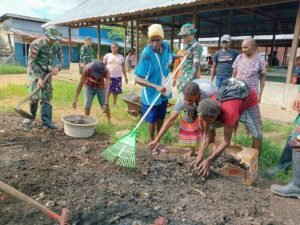 Peringati Hari Sampah Nasional, Satgas Yonif 125/SMB Tumbuhkan Kesadaran Cinta Lingkungan Masyarakat Dengan Membangun Bak Sampah