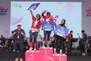 Polwan Polda Lampung Juara 1 Kategori Half Marathon 40+ Kemala Run 2024