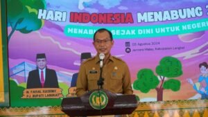 Pj. Bupati Langkat Melalui Sekda Amril Dorong Pelajar Cerdas Mengelola Keuangan Sejak Dini.