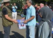 WARGA GELEGI SUKACITA MENERIMA MAKAN SIANG GRATIS HABEMA