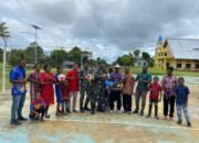 Satgas Yonif 762/VYS Perbaiki Lapangan Voli Dan Penyerahan Bola Voli, Bola Kaki Serta Net Voli Kepada Warga Kampung Bori Timur