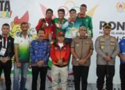 Pj. Bupati Langkat Berikan Medali kepada Juara Cabang Olahraga Sambo: Dorong Semangat Atlet Muda Di Ajang Nasional