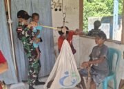 Peduli Kesehatan Anak Dan Balita, Satgas Yonif 131/BRS Membantu Pelayanan Posyandu di Perbatasan Papua