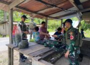 Berikan Pelayanan Kesehatan Gratis, Satgas Yonif 131/BRS Mewujudkan Kemanunggalan TNI Dengan Rakyat