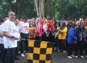 Pj. Bupati Langkat Faisal Hasrimy Lepas Ribuan Guru Dalam Gerak Jalan Santai HUT PGRI ke-79