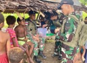 Bentuk Kepedulian Antar Sesama, Satgas Yonif 131/BRS Bagikan Makanan Gratis Untuk Masyarakat Papua
