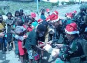 Prajurit Buaya Putih Rayakan Natal Bersama Saling Berbagi
