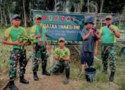 Satgas Pamtas Yonarmed 11 Kostrad Gelar Panen Bersama Warga Desa Tanjung Aru
