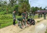Satgas Yonif 762/VYS Memperbaiki Jalan di Kampung Bori