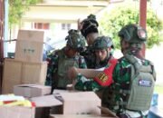 Satgas Yonif 762/VYS Menyelenggarakan Pengobatan Massal di Kampung Kokas.