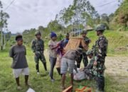Satgas Yonif 521/DY Melaksanakan Binter Berbagi Kasih di Distrik Eragayam Kabupaten Membramo Tengah