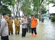 Kapolres Gresik Salurkan Bantuan Sosial Bagi Warga Terdampak Banjir di Benjeng