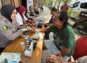 Hari Bhayangkara ke -79, Biddokkes Polda Jatim Gelar Layanan Kesehatan Gratis untuk Driver Ojol