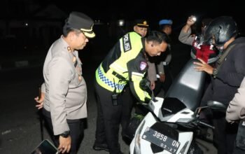 Polres Nganjuk Gelar Patroli SREG dan Penyekatan di Perbatasan Suroan Berjalan Kondusif