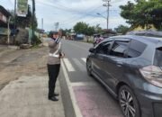 Polwan Pesawaran Hadir di Tengah Masyarakat, Cegah Kemacetan di Depan Sekolah