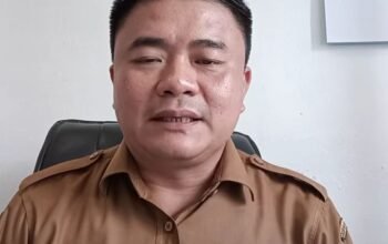 Kadis sosial Kabupaten Nias Utara Elianus Harefa sampaikan informasi kepada Penerima Bansos TW II
