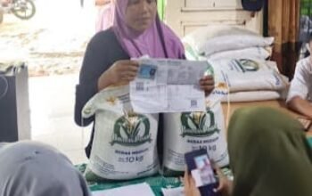 Pemerintah Pekon Malaya Salurksn Bantuan Beras Kepada 221 KPM