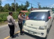 “Polsek IV Nagari Laksanakan Pemasangan dan Pembagian Bendera Merah Putih Jelang Peringatan HUT RI ke-80”