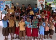 Tawa dan Semangat Merah Putih Warnai Lomba Satgas Yonif 131/Brajasasakti Bersama Anak-Anak SD Kampung Yetti