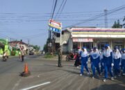 Kodim 0601/Pandeglang Amankan Lomba Gerak Jalan HUT RI ke-80 di Kecamatan Menes