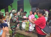 Satgas Pamtas RI-PNG Yonif 763/SBA Pos Kumurkek Gelar Pemeriksaan Kesehatan dan Bagikan Baju Layak Pakai kepada Warga