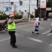 Antisipasi Kemacetan, Jajaran Polres Langkat Gelar Pengaturan Lalu lintas di Pagi Hari